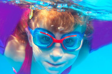 Underwater swimming girl goggles blue water clipart