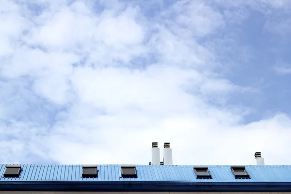 Blue steel roof skylight windown chimney sky — Stock Photo, Image
