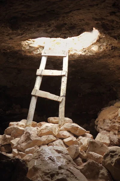 Barbaria cape cave hole aged wood steps — Stock Photo, Image
