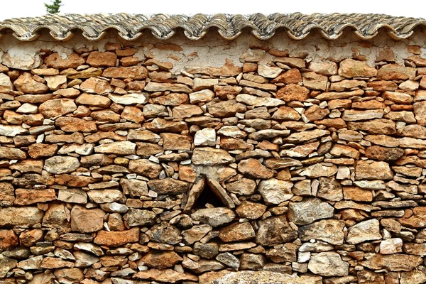 Metselwerk stenen muur driehoek windows formentera — Stockfoto