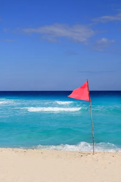 Dangerous red flag in beach rough sea signal — Stock Photo, Image