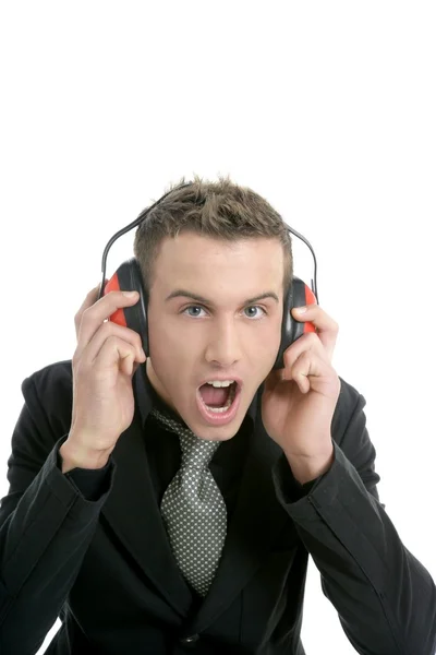 Üzletember kiáltás, zajos környezetben, fejhallgatók — Stock Fotó