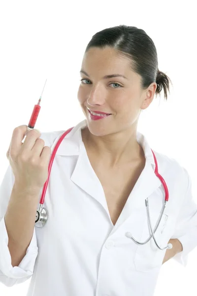 Piękna kobieta lekarz z strzykawka czerwony — Zdjęcie stockowe