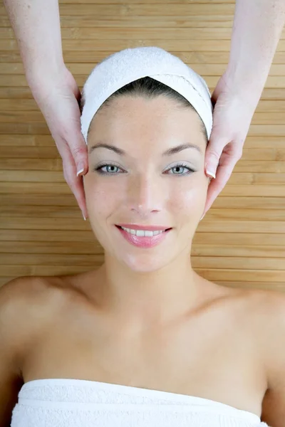 Head massage over bamboo, blue eyes woman — Stock Photo, Image