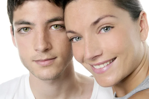 Beautiful young couple closeup portrait over white — Stock Photo, Image