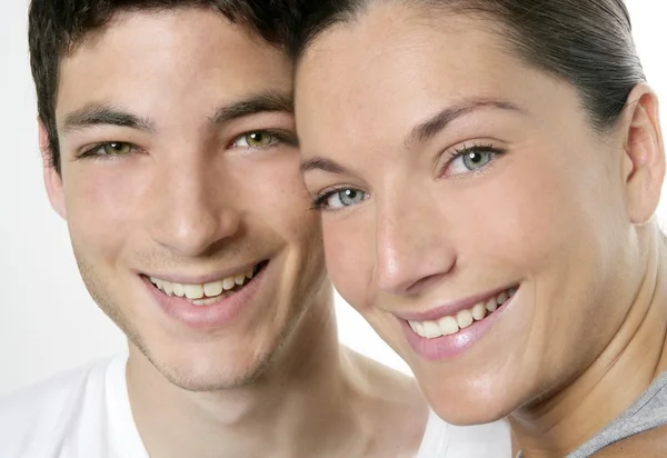Beautiful young couple closeup portrait over white — Stock Photo, Image