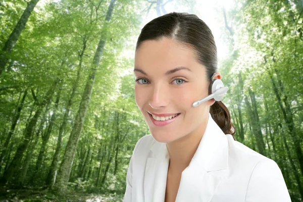 Beautiful headset woman in an forest — Stock Photo, Image
