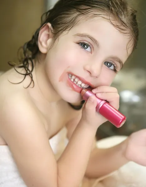 Little girl with lipstick on the bathroom — Stock Photo, Image