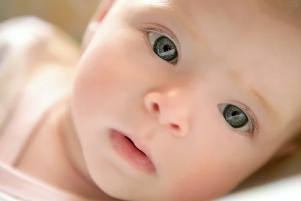 Blond little baby laying on bed portrait — Stock Photo, Image