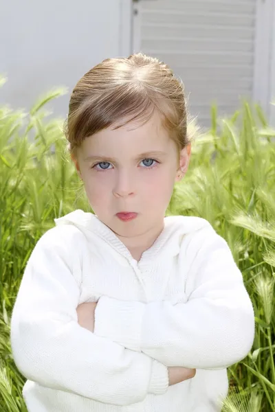 Angry disappointed gesture little girl meadow — Stock Photo, Image