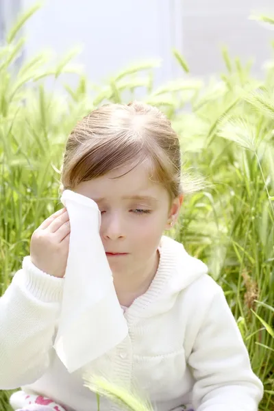Sad little girl crying outdoor green meadow field — Stock Photo, Image