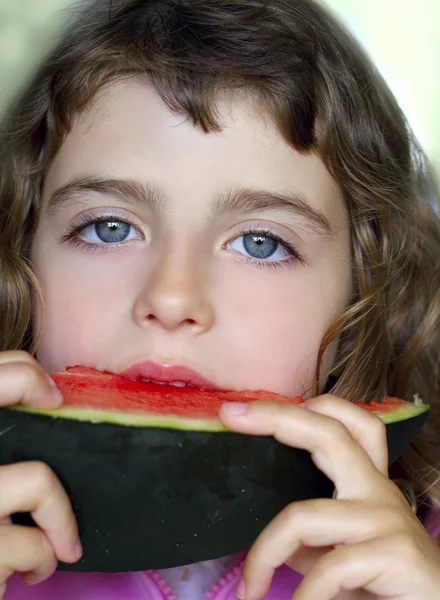 Closeup little girl portrait eating watermelon slice — Stock Photo, Image