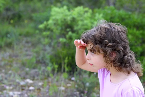 Explorer little girl forest park searching — Stok fotoğraf