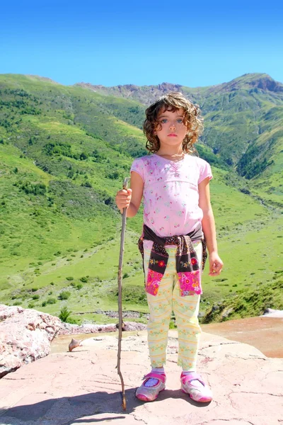 Explorer mountain girl hicker stick cane green valley — Stock Photo, Image