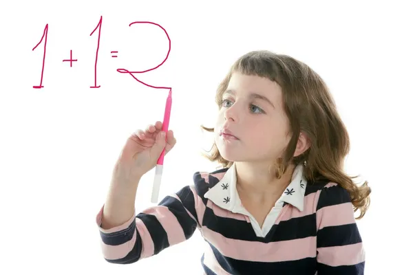 Little girl writing add numbers marker Royalty Free Stock Images