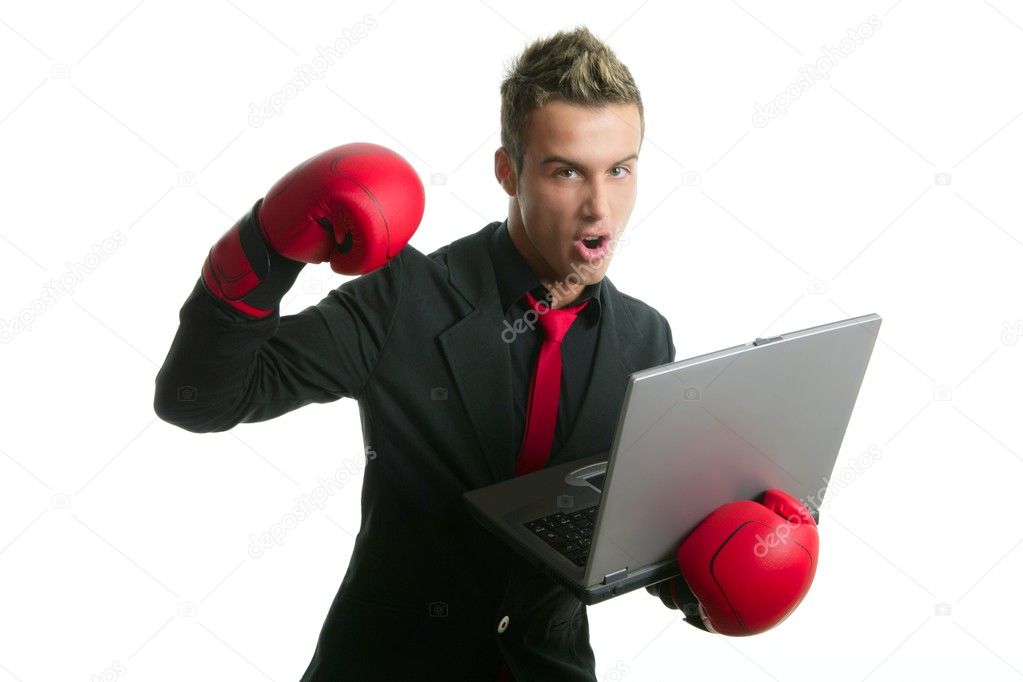Angry with laptop computer young boxer businessman