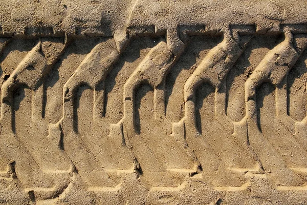 Tractor tires pneus footprint printed on beach sand — Stock Photo, Image
