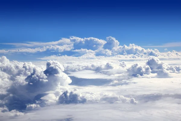 Blue sky high view from airplane clouds — Stock Photo, Image