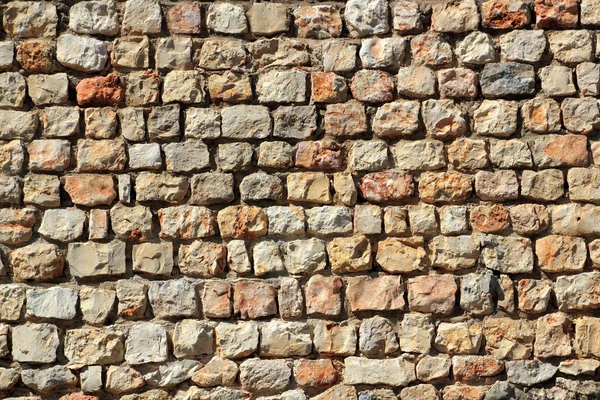 Bruin metselwerk stenen muur Spanje volmondig — Stockfoto