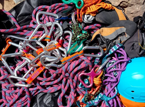 Climbing equipment shackles harnesses ropes — Stock Photo, Image