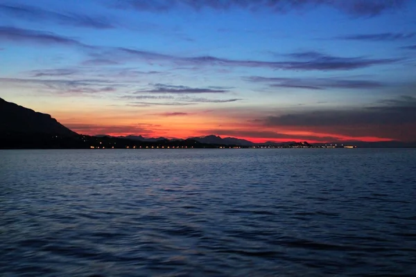 stock image Denia sunset view from sea Mediterranean backlight