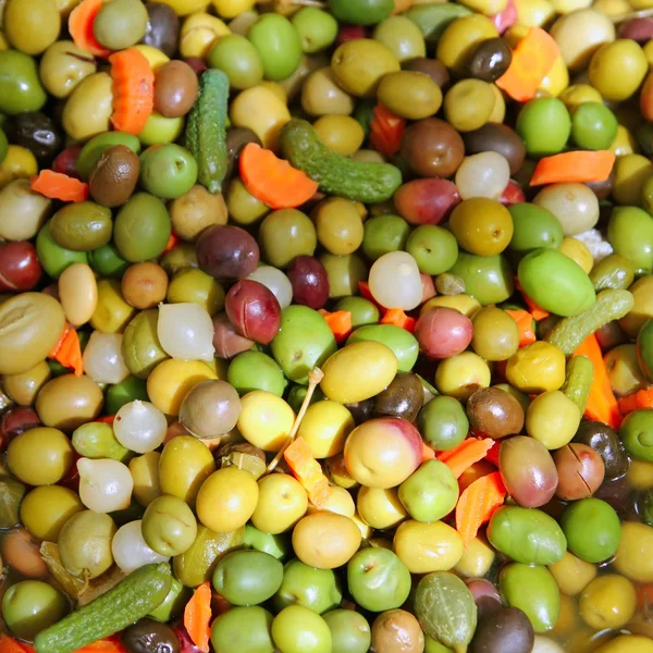 Aceitunas y encurtidos textura patrón de alimentos mediterráneo —  Fotos de Stock