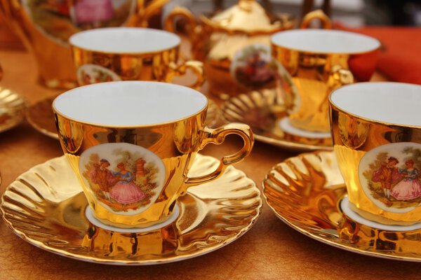 Ancient golden porcelain cups coffe or tea