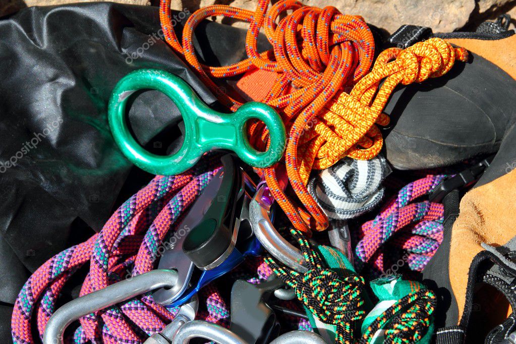 Climbing equipment shackles harnesses ropes — Stock Photo © lunamarina ...