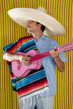 Mexican man serape poncho sombrero playing guitar clipart