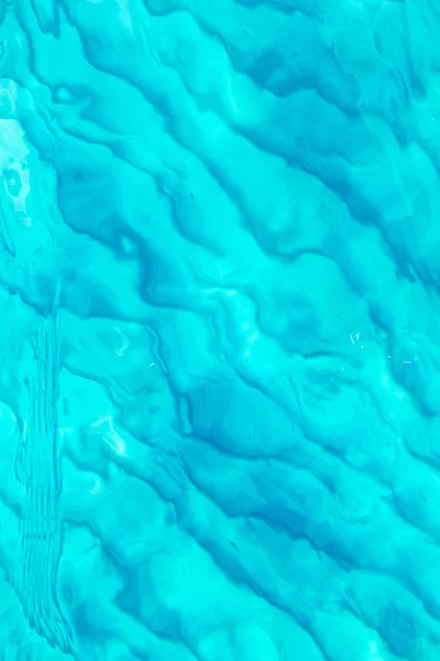Aqua turquoise tropisch strand water golven patroon — Stockfoto