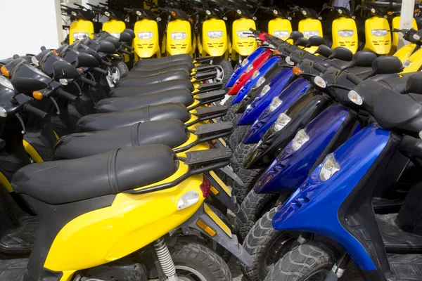 Bikes motorbikes motorcycles rows in a renting — Stock Photo, Image