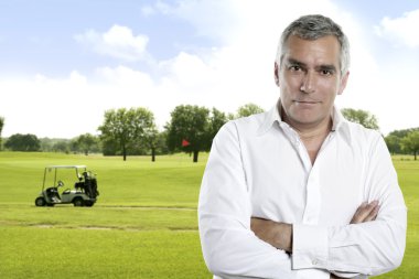 Golf senior golfer man portrait in green couse outdoor clipart