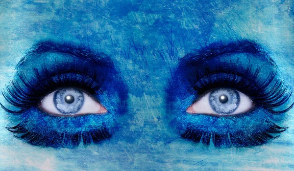 Streszczenie niebieskie oczy makijaż kobieta grunge tekstur — Zdjęcie stockowe