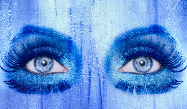 抽象的蓝眼睛化妆女人 grunge 纹理 — 图库照片