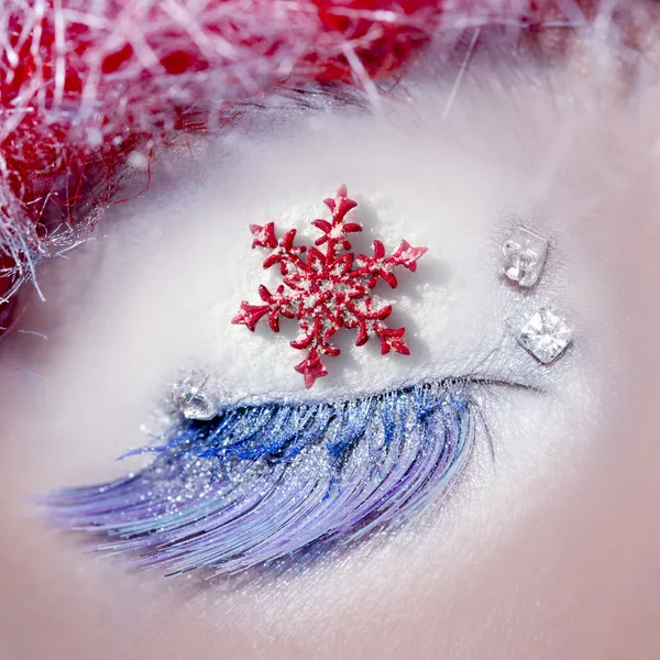 Χριστουγεννιάτικο αστέρι έννοια μάτι μακιγιάζ χειμώνα κόκκινο ασημί — Φωτογραφία Αρχείου