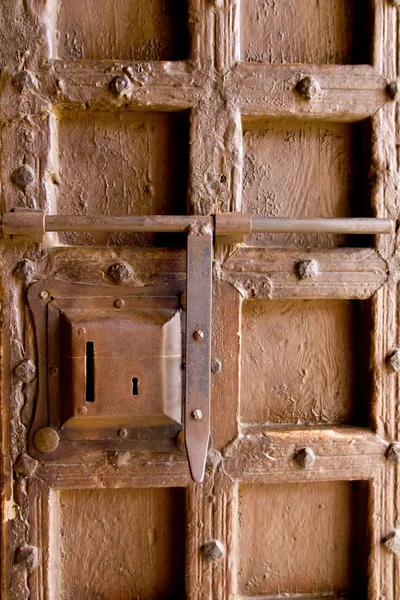 Aged medieval wooden door lock keyhole — Stock Photo, Image