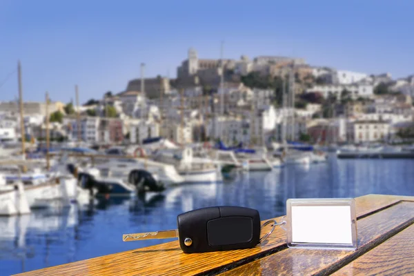 Car rental keys on wood table in Ibiza town — Stock Photo, Image