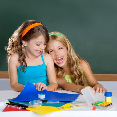 Happy laughing kids student girls at school classroom clipart