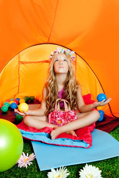 Children girl inside camping tent relaxing with yoga — Stock Photo, Image