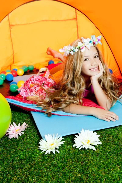Children fashion little girl lying indoor of camping tent — Stock Photo, Image