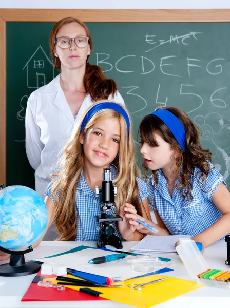 Kids students with nerd teacher woman at school — Stock Photo, Image