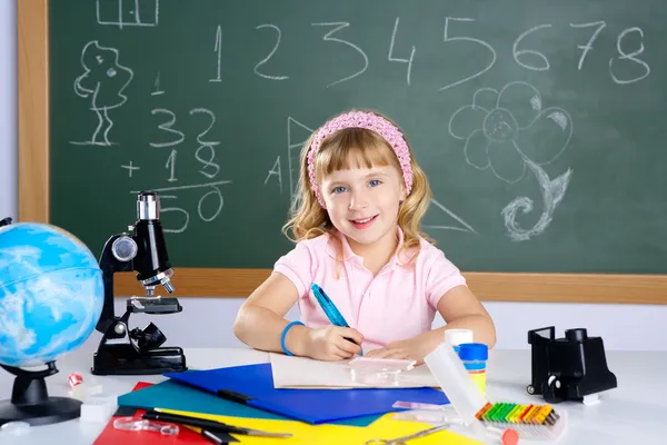Children little girl at school classroom with microscope — Stock Photo, Image