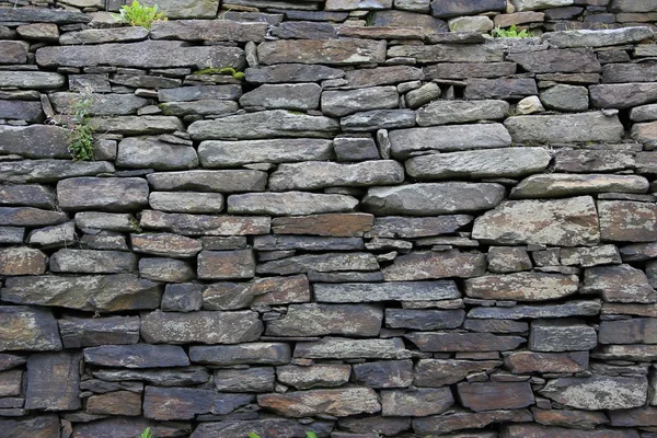 Dark stone wall — Stock Photo, Image
