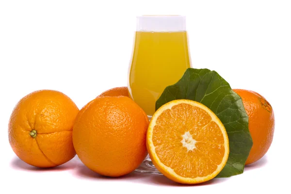 Bunch of oranges with juice — Stock Photo, Image