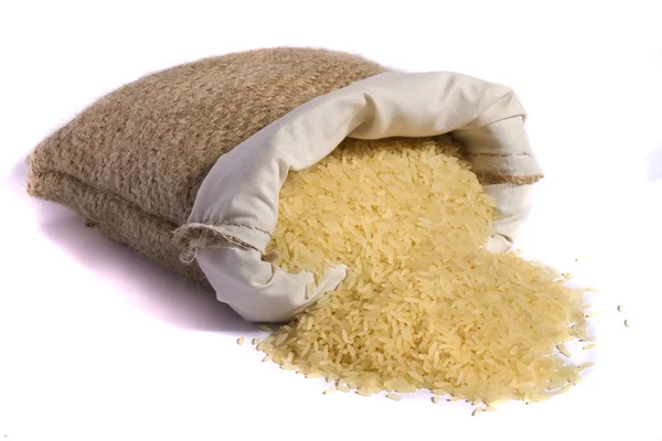 Мешок жёлтого риса — стоковое фото