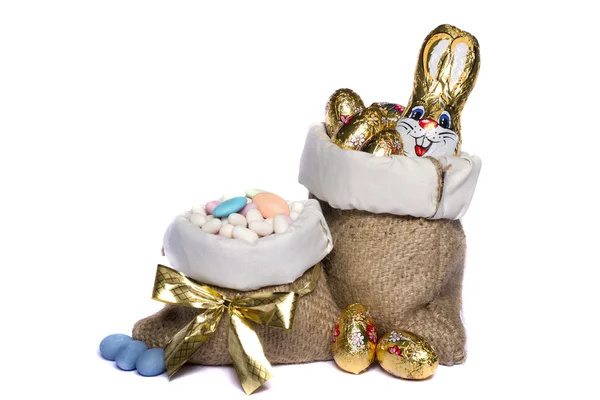 Sweet almonds and chocolate bunnies — Stock Photo, Image