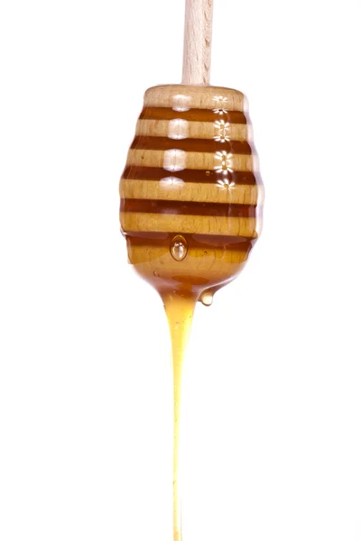 Капает мед — стоковое фото