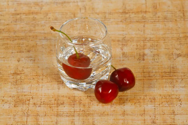 The beverage and cherry — Stockfoto