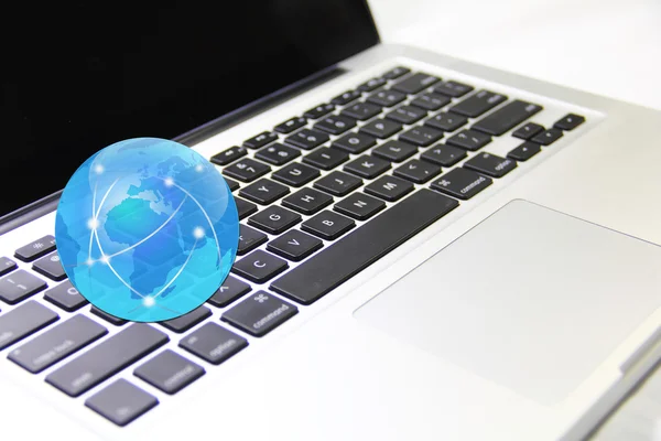 The earth on a laptop computer — Stock Photo, Image