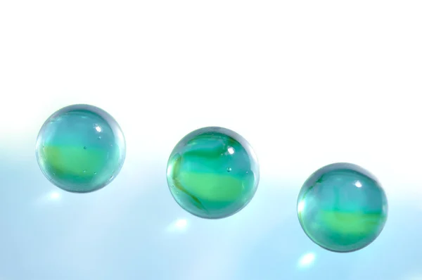 Três esferas translúcidas de vidro — Fotografia de Stock
